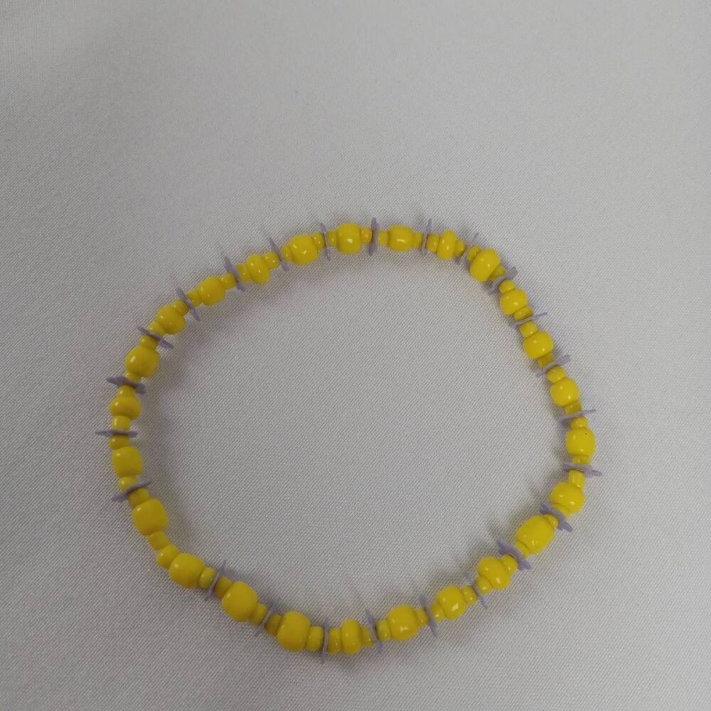 💍yellow and purple beaded bracelet
